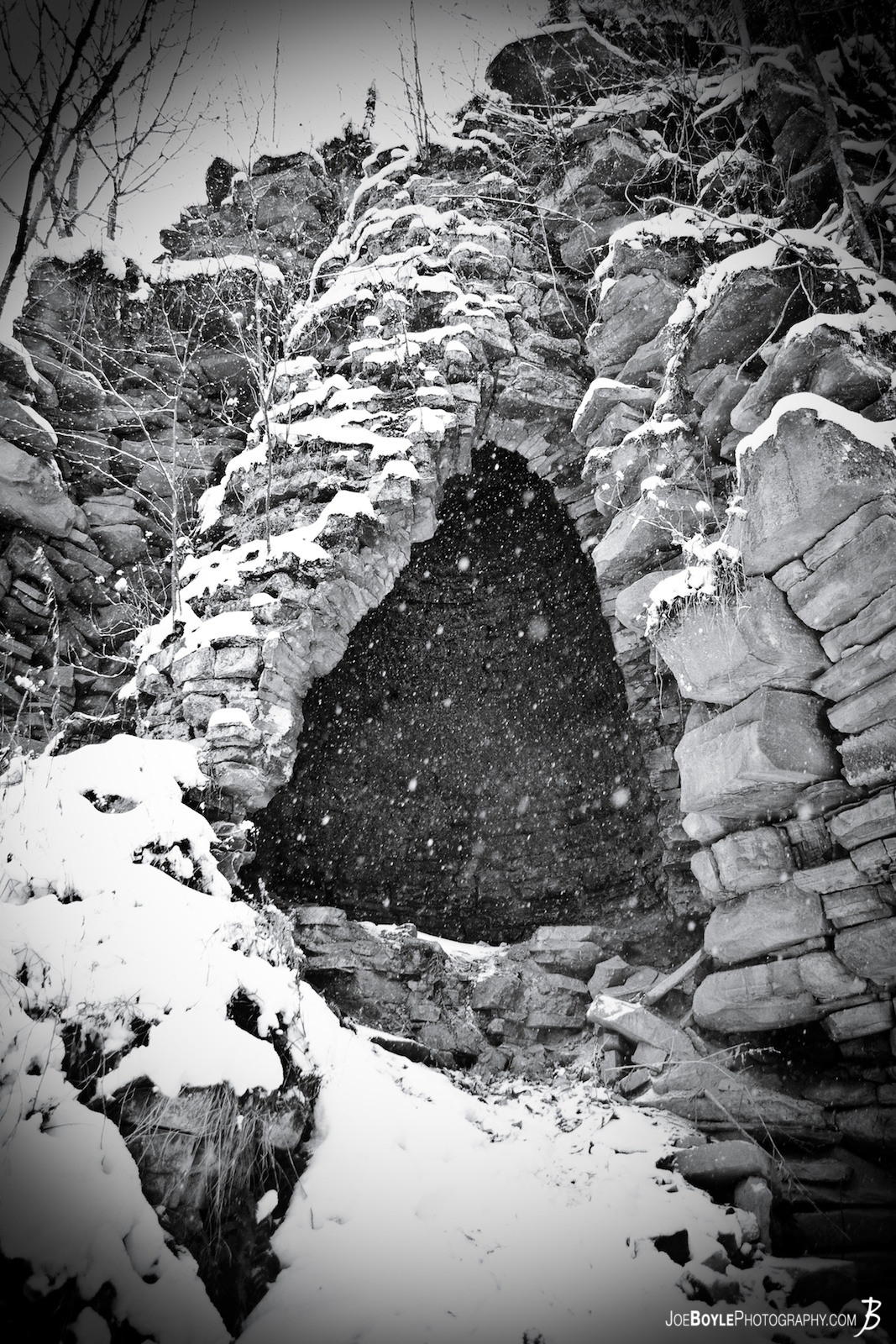  While hiking a trail in PA I discovered this old Iron Ore Furnace. It was used during the 1900s and has been left to erode itself into a pile of romantic rubble. 