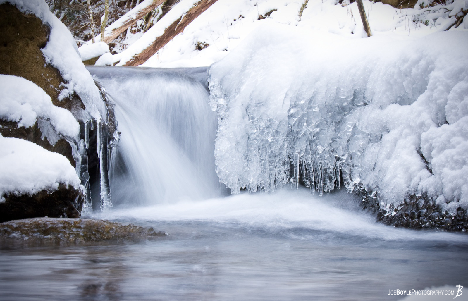  I captured this image on a cold morning after waking up to snow covered wilderness. This image was taken near the Allegheny Gorge in Pennsylvania. 