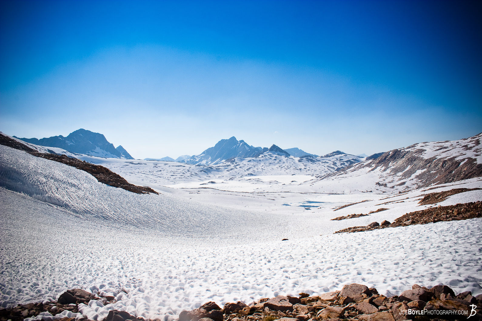  This photo was taken at the top of Muir Pass on the John Muir Trail. This was a HARD hiking day! The snow was very soft by the time we got there and we fell through the snow (up to our waist) many times! It made for a long and tiring day... 