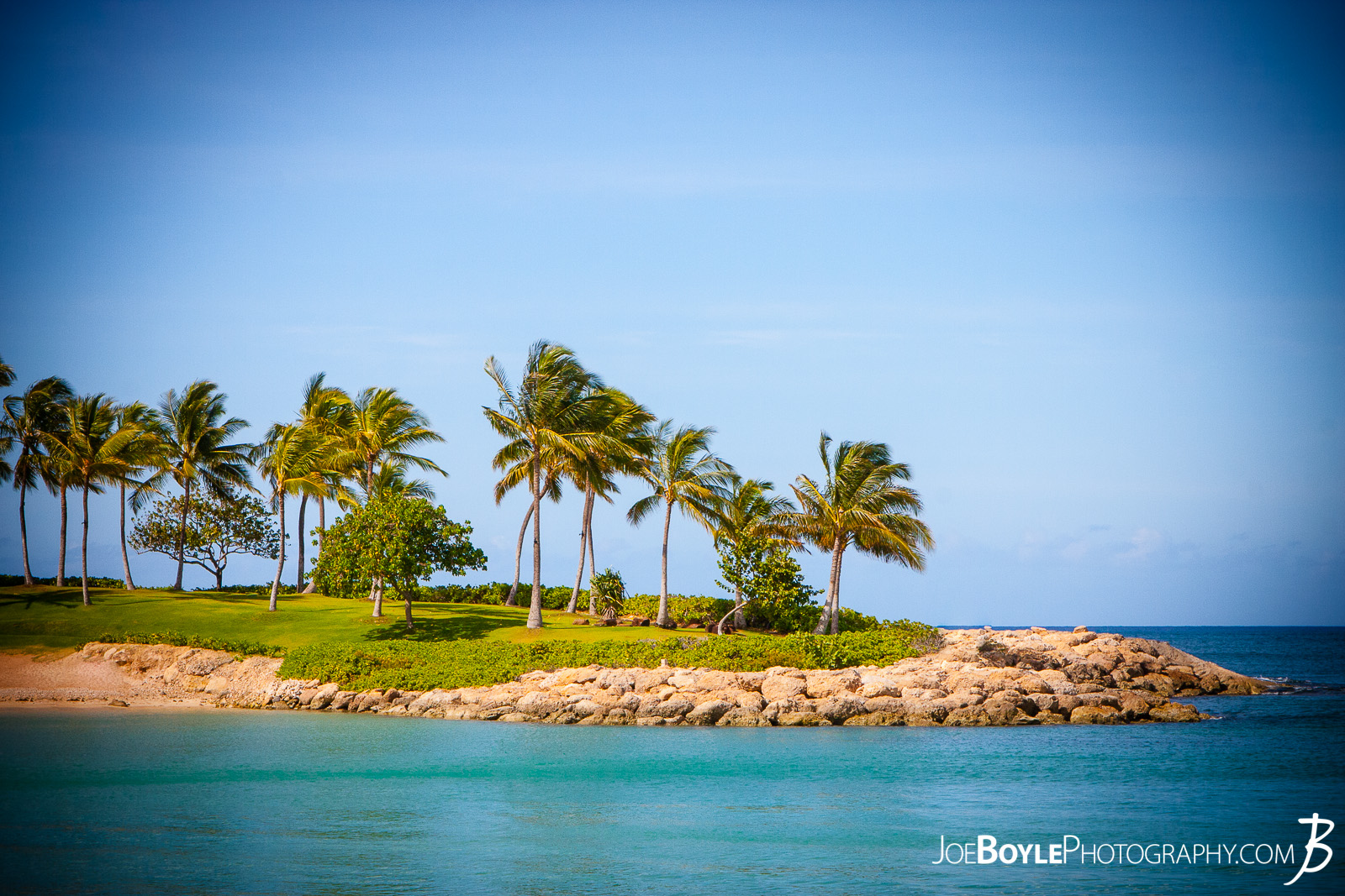  While on a trip to Hawaii, I was so fortunate to stay at a resort that had direct acess to a beach and lagoon! Complete with Palm Trees and a beautiful blue sky! This is Kohola lagoon near Aulani resort. 