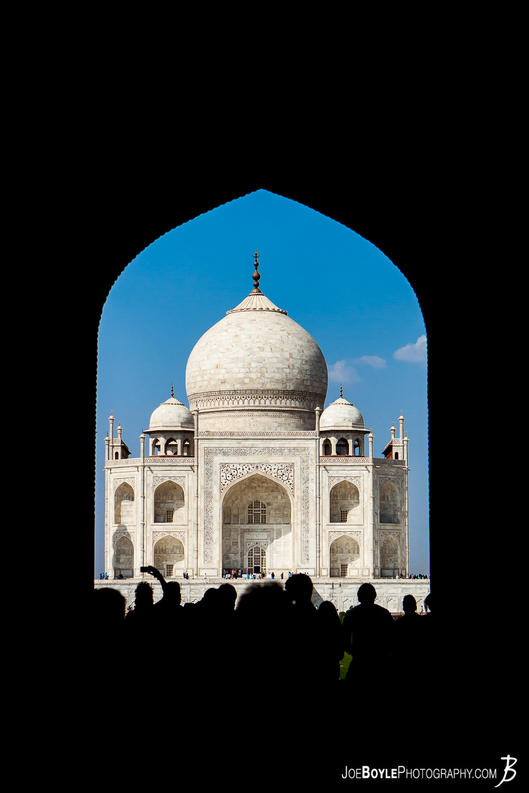  I was on tour with MegaDeth during their 2012 "Countdown to Extinction" tour. We had a stop over in New Dehli, India and had a chance to see a few sights. The Taj Mahal being one of them! I'm not usually super impressed by buildings and such but this one takes the cake! It really is magnificent. This photo was taken from inside the main entrance leading to the Taj Mahal gardens. 