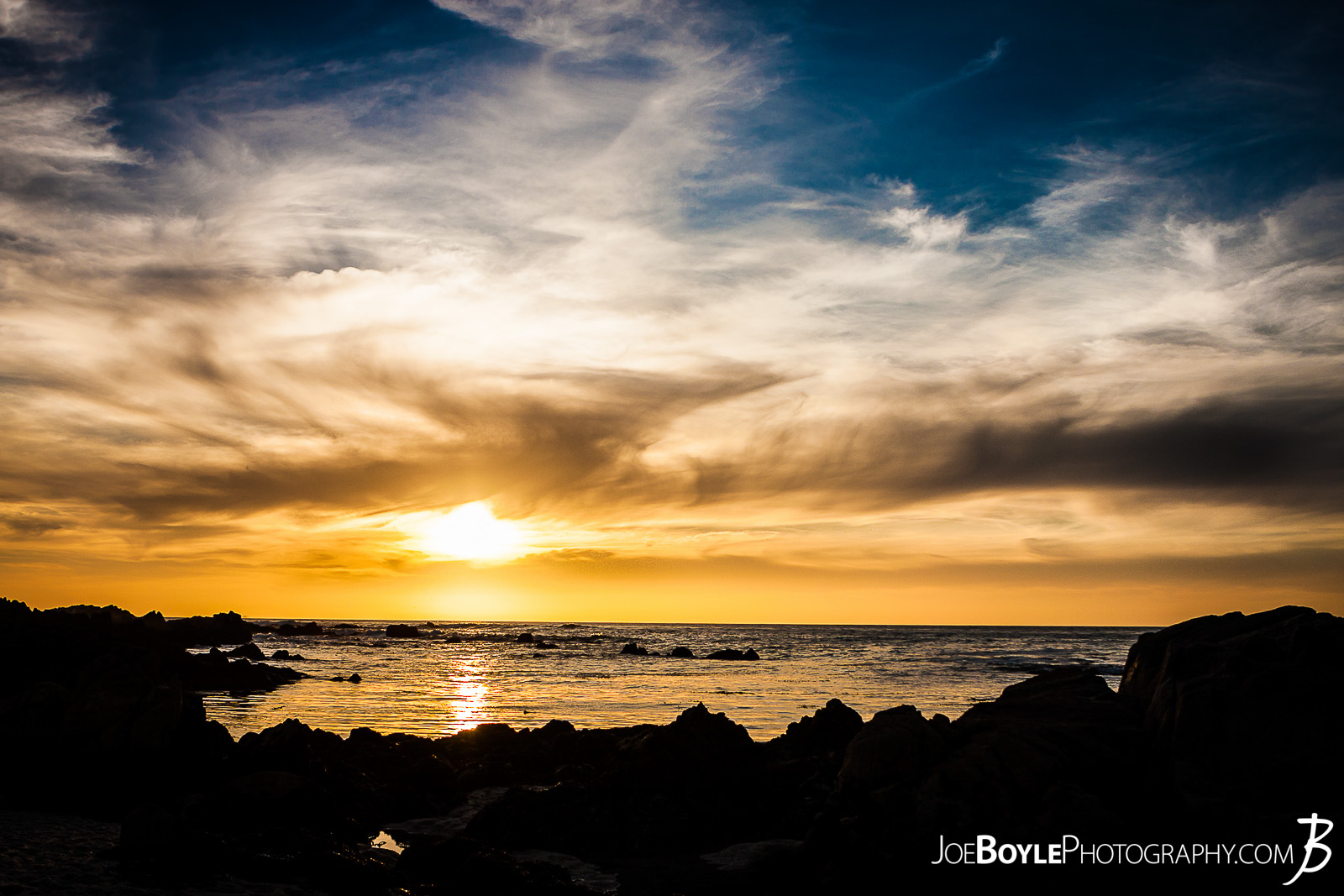  When I was traveling to Monterey, California I spent a lot of time just walking around the city, Pacific Grove and the sand dunes in the area. Here is a shot of a beautiful, golden sunset in Pacific Grove! 