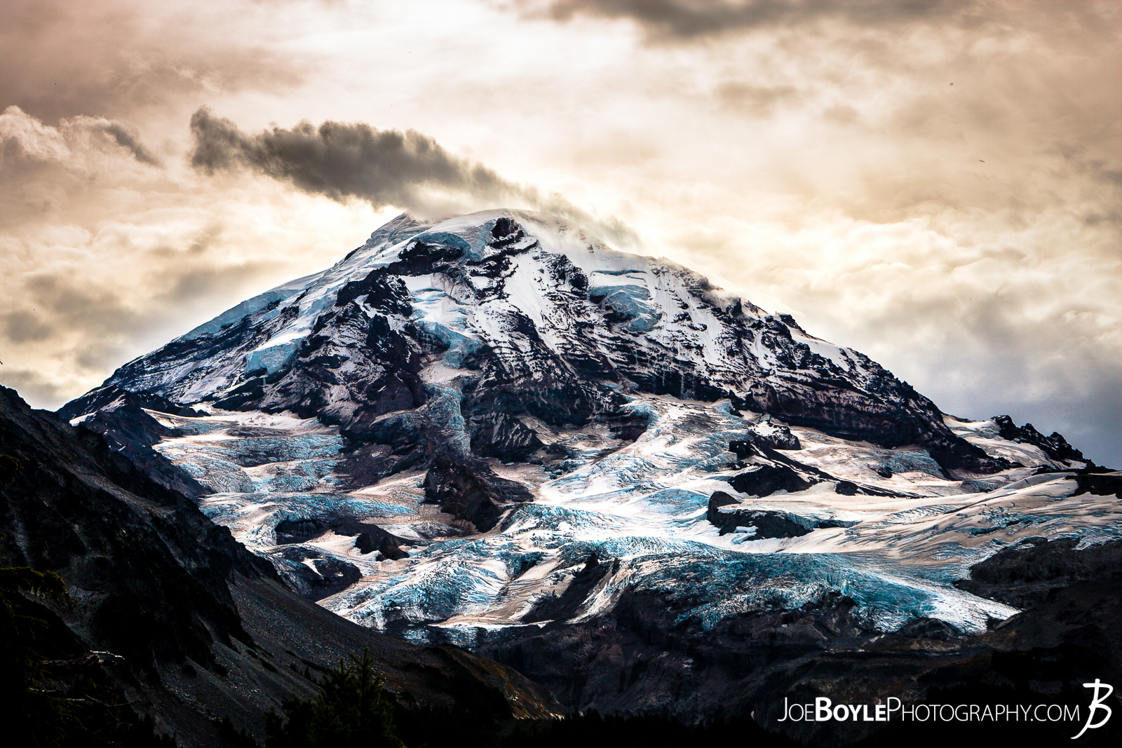  After we left Mowich Lake Campground, my buddy and I decided to take the Spray Park trail instead of the Wonderland Trail Proper. I read in Bette Filley's book, "Discovering The Wonders of the Wonderland Trail" that Spray Park offers some magnificent views of Rainier whereas the Wonderland Trail is more forested and covered. The only catch is that if it's bad weather, Spray Park is absolutely miserable as there is no cover and it's the highest point on the trail. Thankfully we lucked out and had blue skies and great views! 