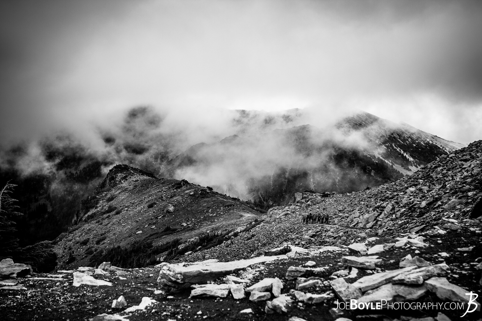  This is a photo of the Wonderland Trail near Skyscraper Pass. It was a windy and cold day! I also appreciated the change in environment, the rocks and barrenness was a neat contrast to the forested and dirt trails. 