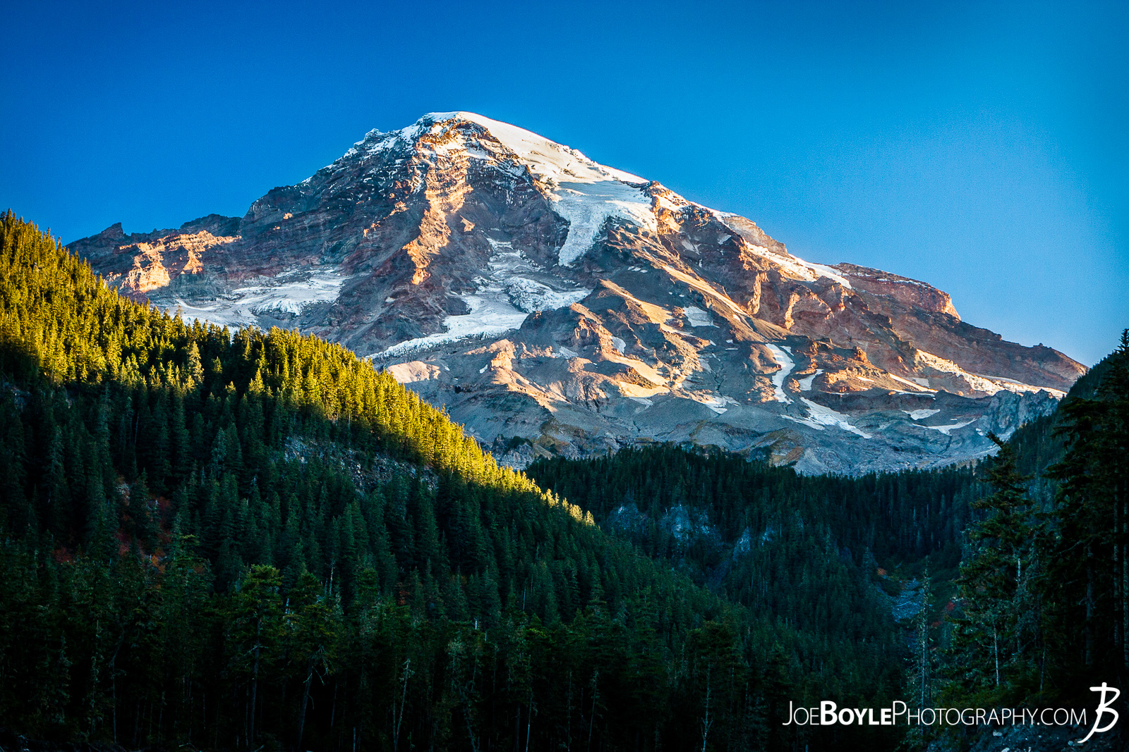  Mount Rainier Sunrise from the Paradise River crossing on The Wonderland Trail. We were on our way out of the Paradise River Campground and en route to the Longmire Trailhead. 