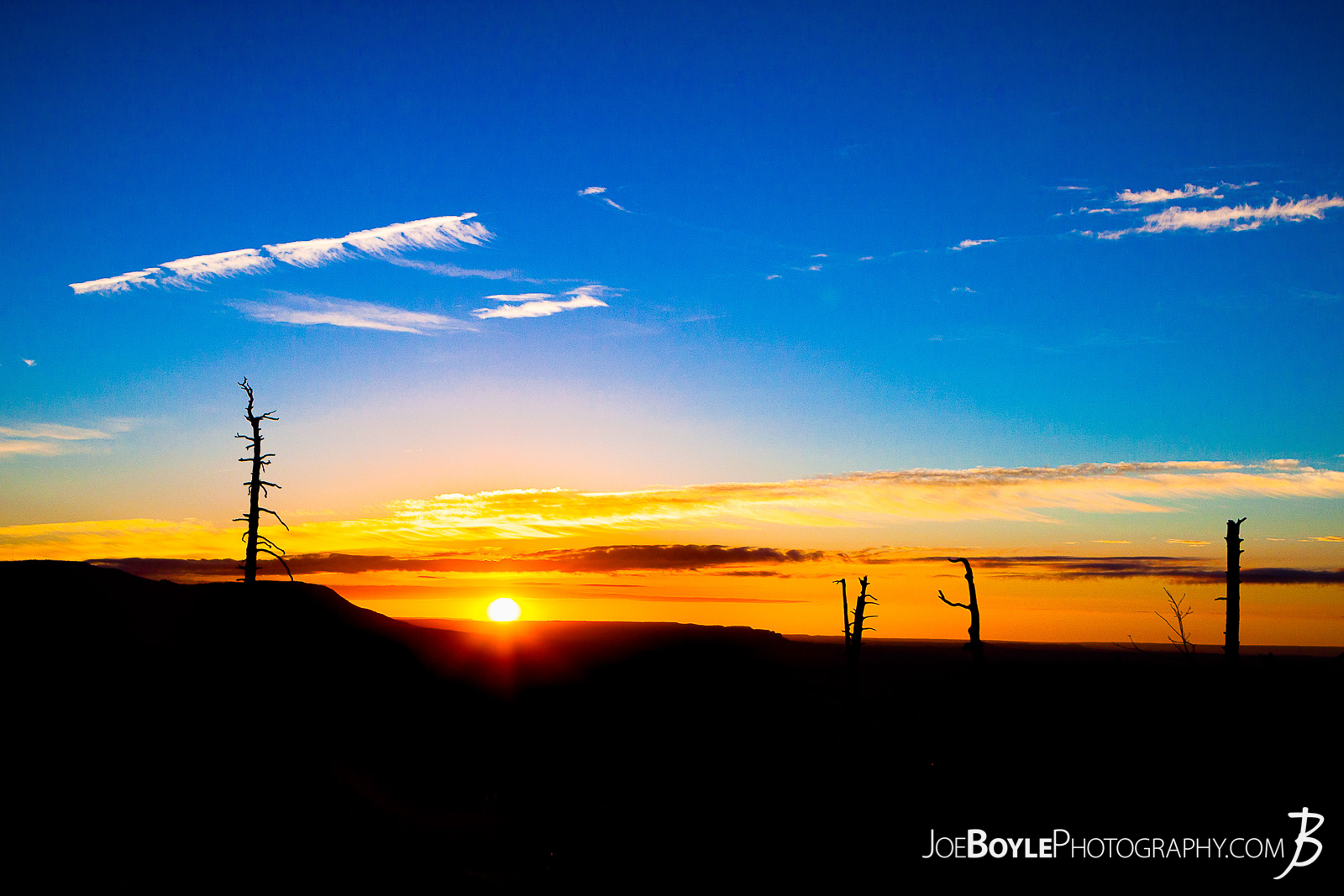  While hiking on the West Rim Trail in Zion National Park my hiking buddy and I decided to get up early one morning and hit the trail! I'm glad we did because we got to see this magnificent, beautiful and colorful sunrise! We spent a few nights hiking this trail to the end of the West Rim Trail. We finished up this leg of the trip hiking Angel's Landing and exited at The Grotto.  Here are some links to more articles and hiking info about the West Rim Trail and hiking trails in Zion National Park and a Map of Zion National Park. 