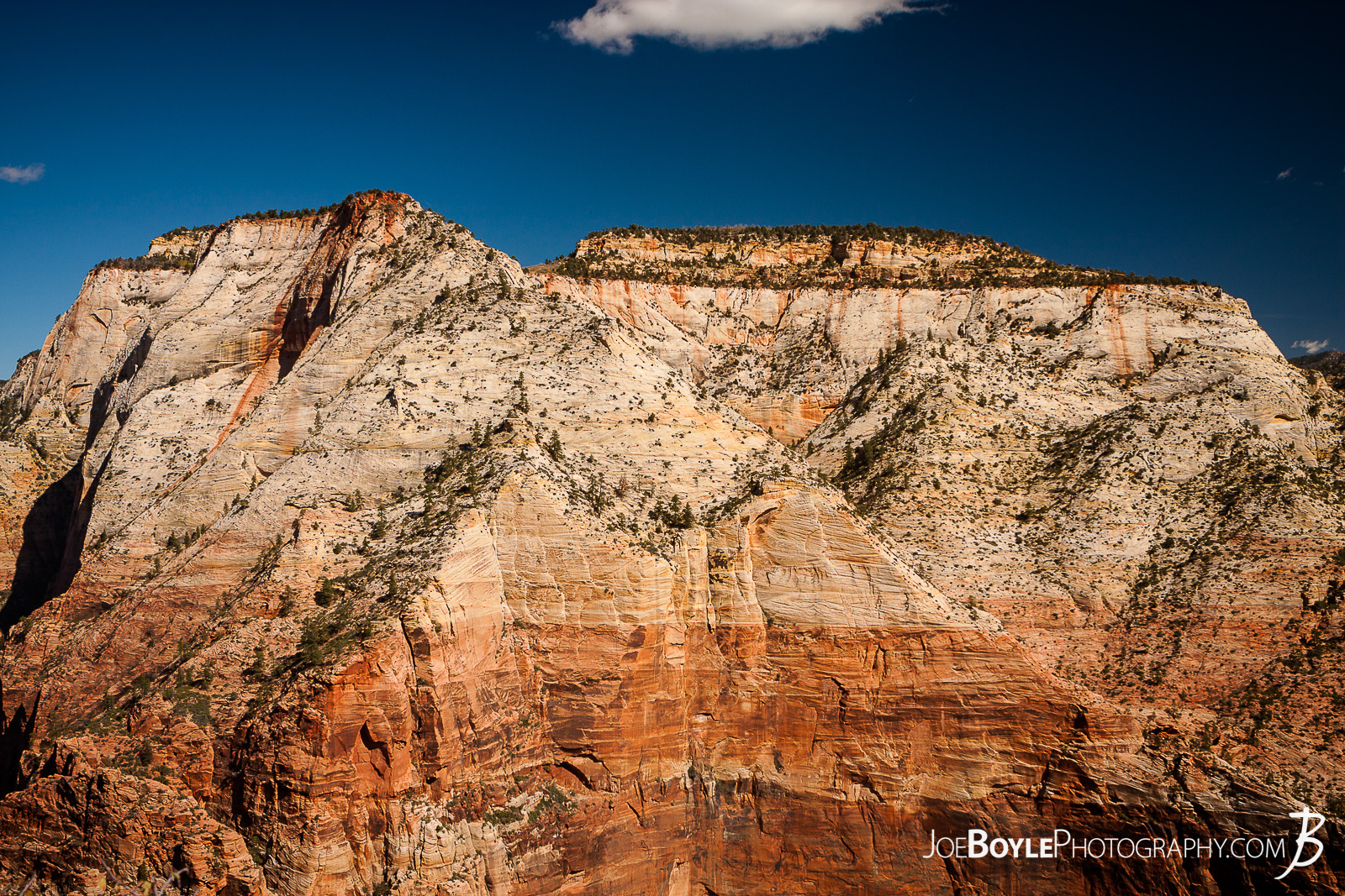 While hiking on the West Rim Trail in Zion National Park my hiking buddy and I were able to see many mountains, canyons and valleys! This is a photo of a mountain near the end of our trip during sunset. We finished up this leg of the trip hiking Angel's Landing and exited at The Grotto.  Here are some links to more articles and hiking info about the West Rim Trail and hiking trails in Zion National Park and a Map of Zion National Park. 