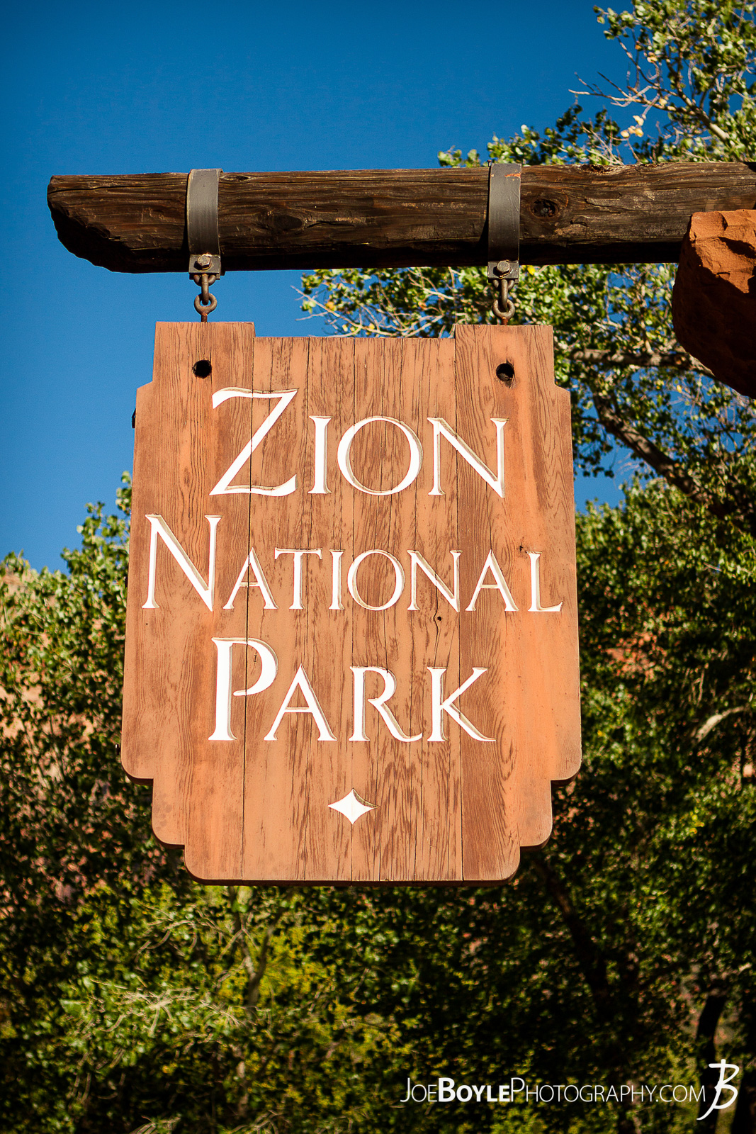  Here is a photo of the sign at the entrance of Zion National Park with a beautiful blue sky!  Here are some links to more articles and hiking info about the West Rim Trail and hiking trails in Zion National Park and a Map of Zion National Park. 