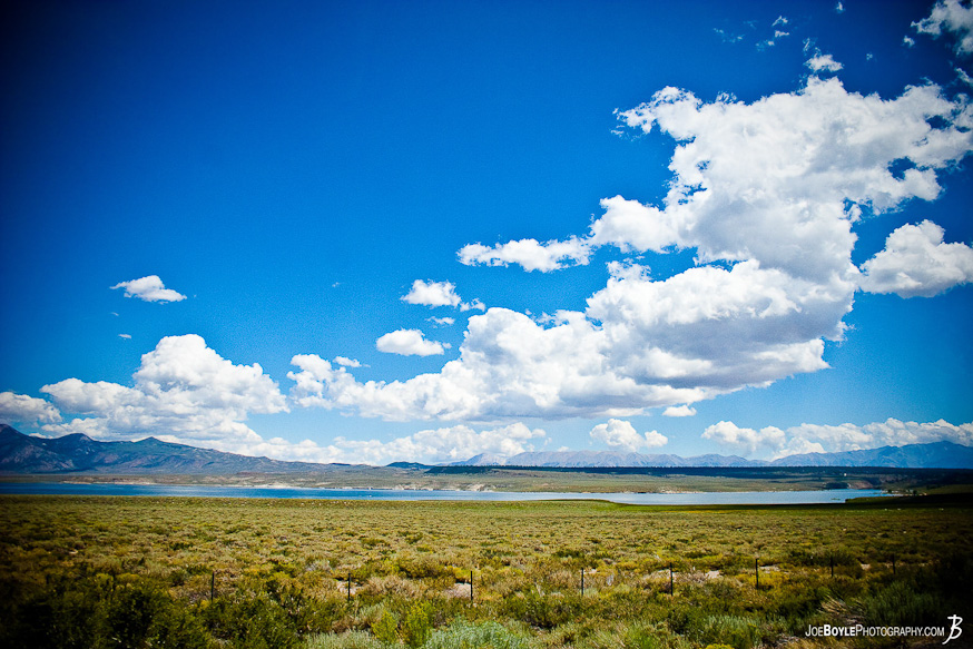 As I was traveling through California the sky was a beautiful blue with a unique cloud formation. As I was traveling through California the sky was a beautiful blue with a unique cloud formation.