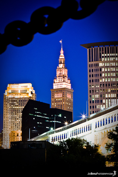 A night photo of the Terminal Tower &amp; Veterans Memorial Bridge.