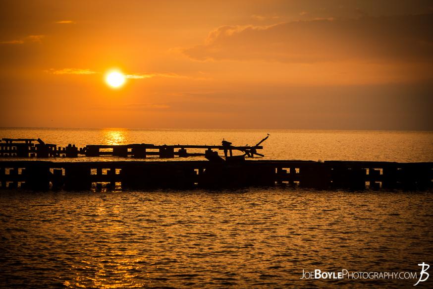 A beautiful sunset off the coast of Lake Erie with a pier in the foreground. This image was capture in Cleveland Ohio, specifically near Edgewater Park. A beautiful sunset off the coast of Lake Erie with a pier in the foreground. This image was capture in Cleveland Ohio, specifically near Edgewater Park.