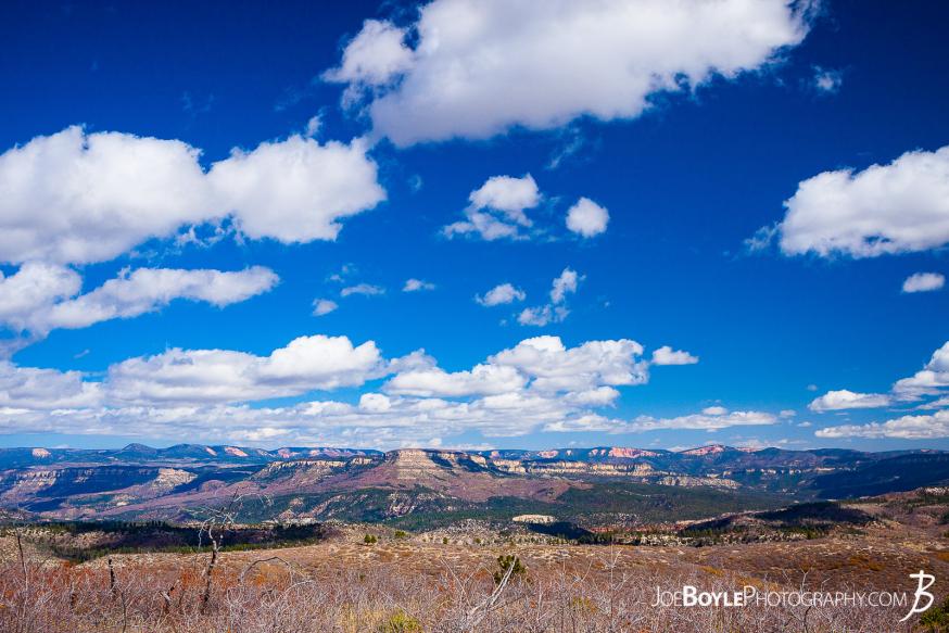 This is a photo of a beautiful blue sky, awesome clouds &amp; canyons in Zion National Park.
