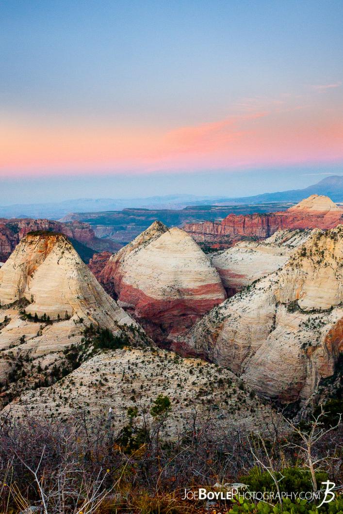 canyons-mountain-peaks-and-valleys-during-a-sunrise-in-zion-national-park-portrait